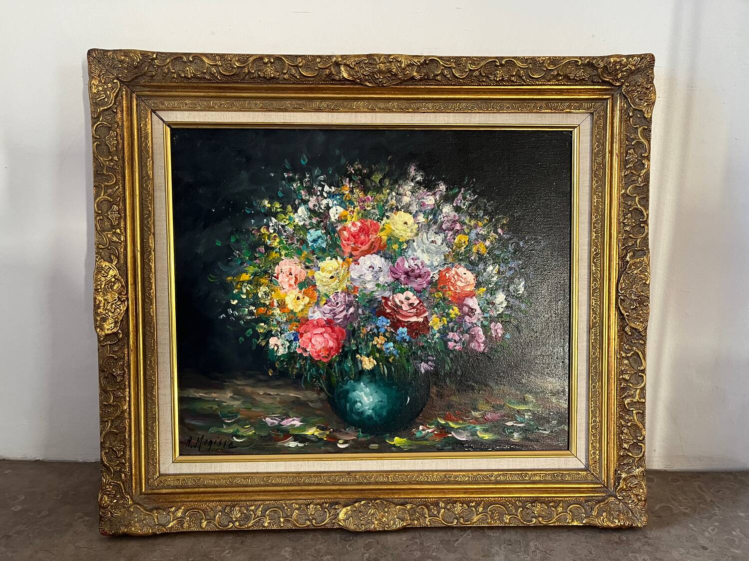 Framed bouquet of flowers, oil on canvas signed R Mogisse.