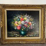 Framed bouquet of flowers, oil on canvas signed R Mogisse.