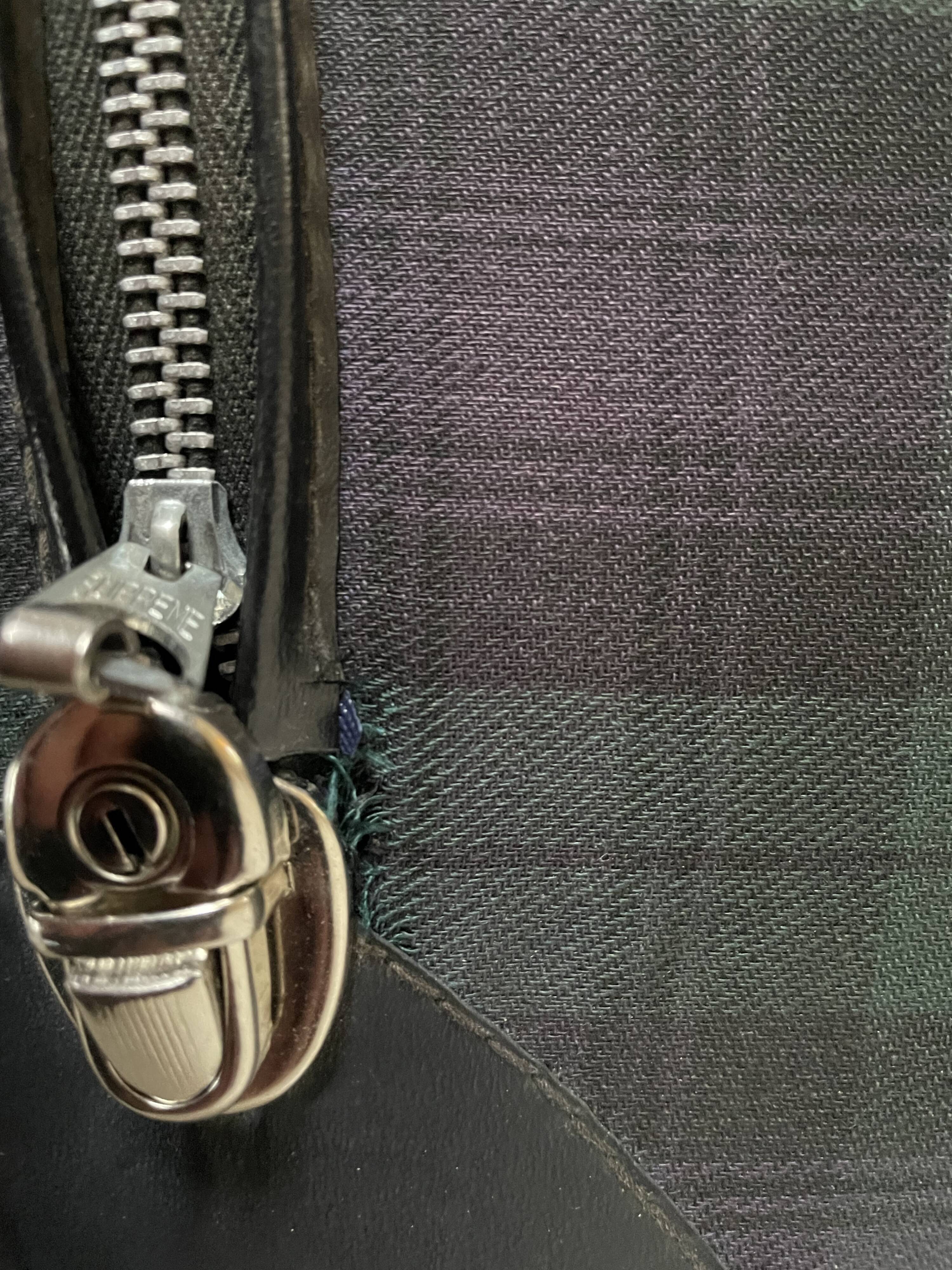 Tartan check suitcase