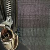 Tartan check suitcase