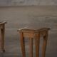 A pair of antique Danish pine stools from the late 19th century.