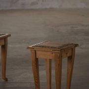 A pair of antique Danish pine stools from the late 19th century.