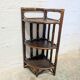 Rattan corner shelf