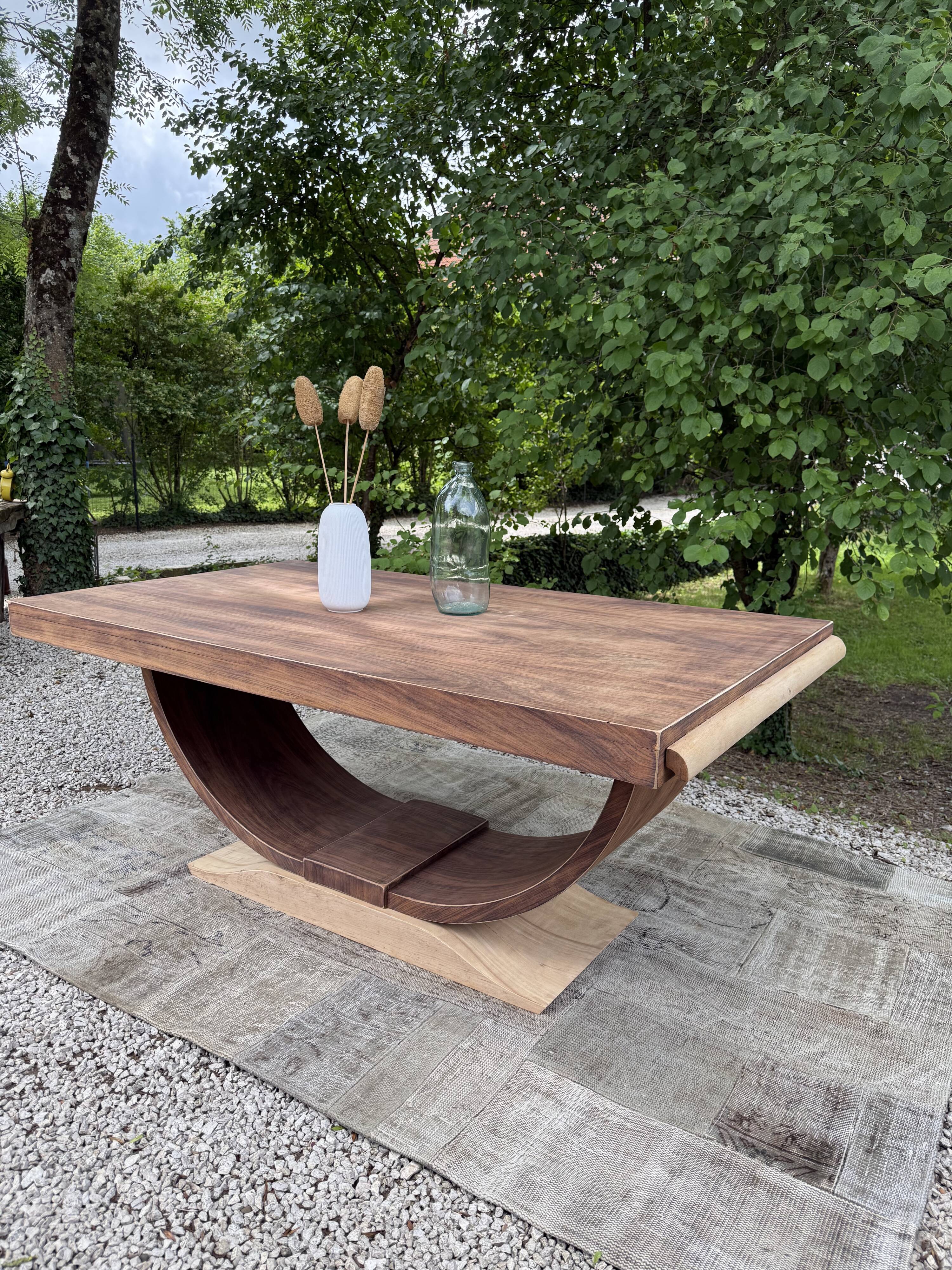 Renovated wooden table with extensions.