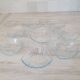 8 small shell-shaped ramekins in transparent glass