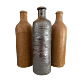 Lot de trois bouteilles en grès