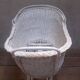 Wicker and painted wood baby cradle