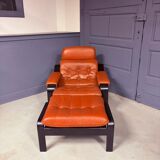 Vintage 1970s armchair with ottoman, leather and wood