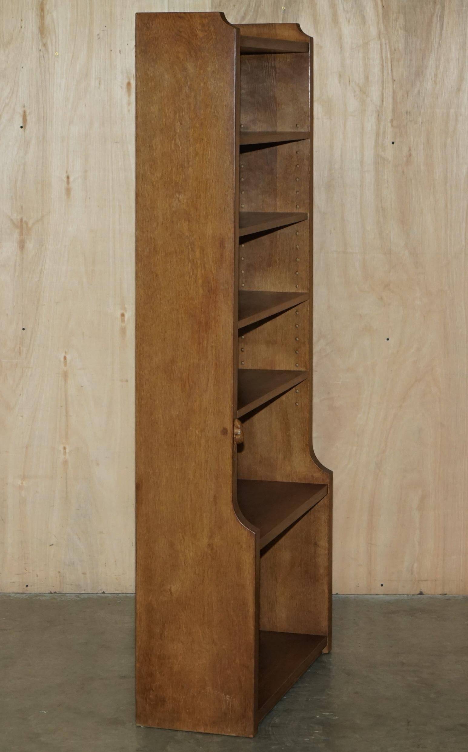 Pair of Robert Mouseman Thompson oak carved bookshelves.