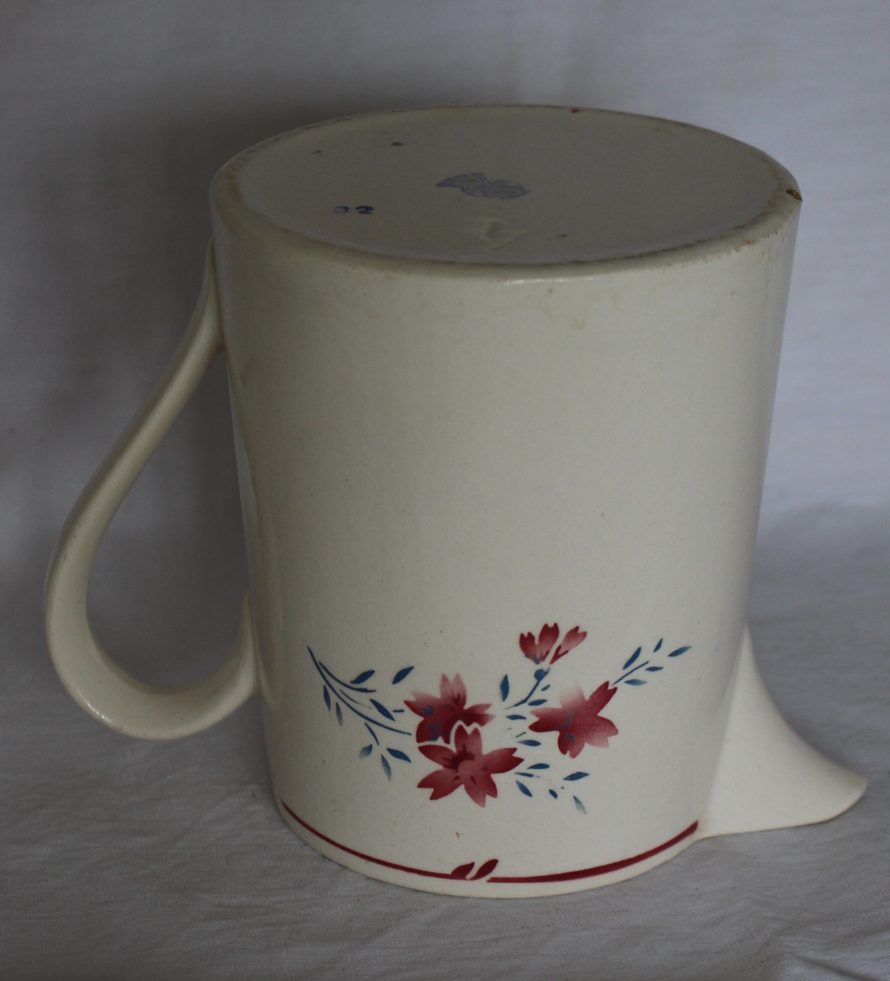 Small pitcher in half-porcelain "floral motif"