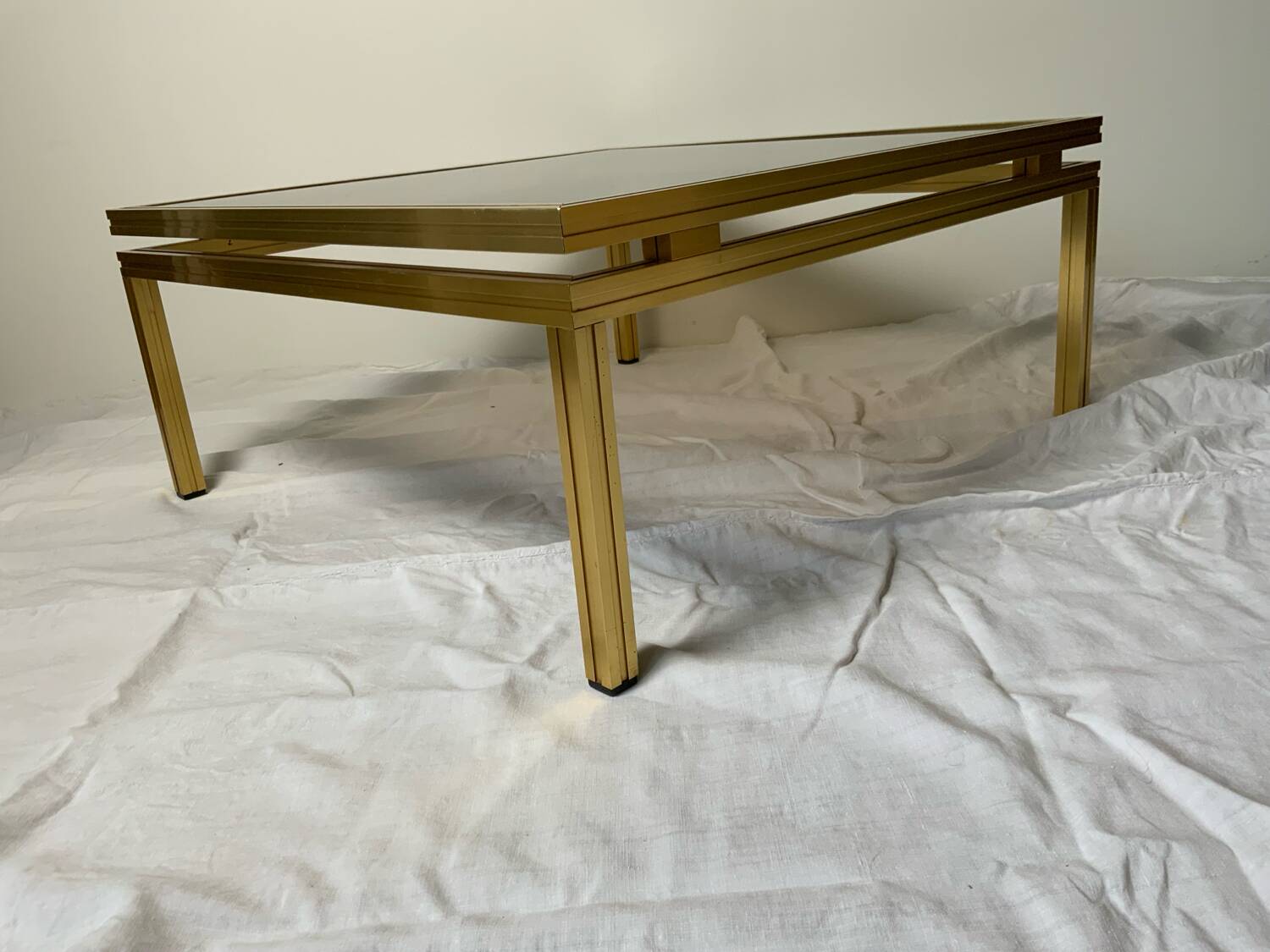 Glass and brass coffee table