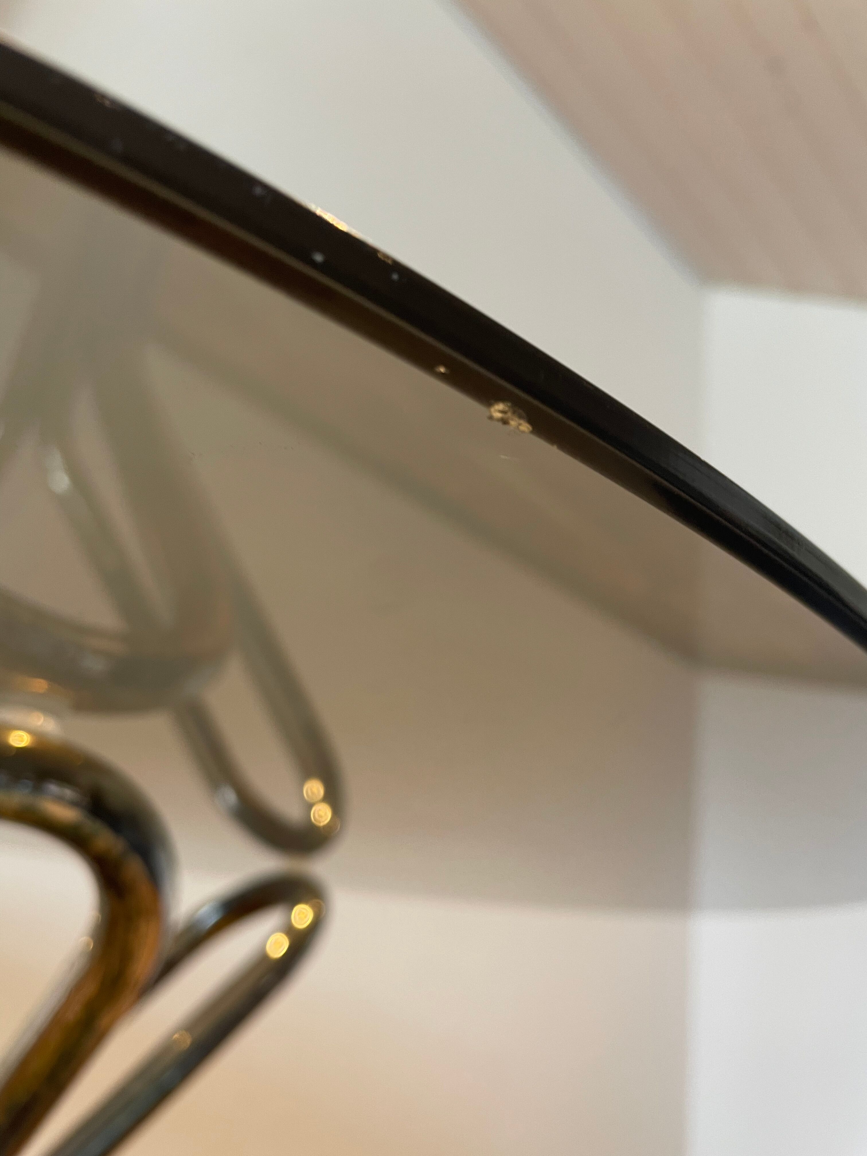 Round table in chrome and smoked glass