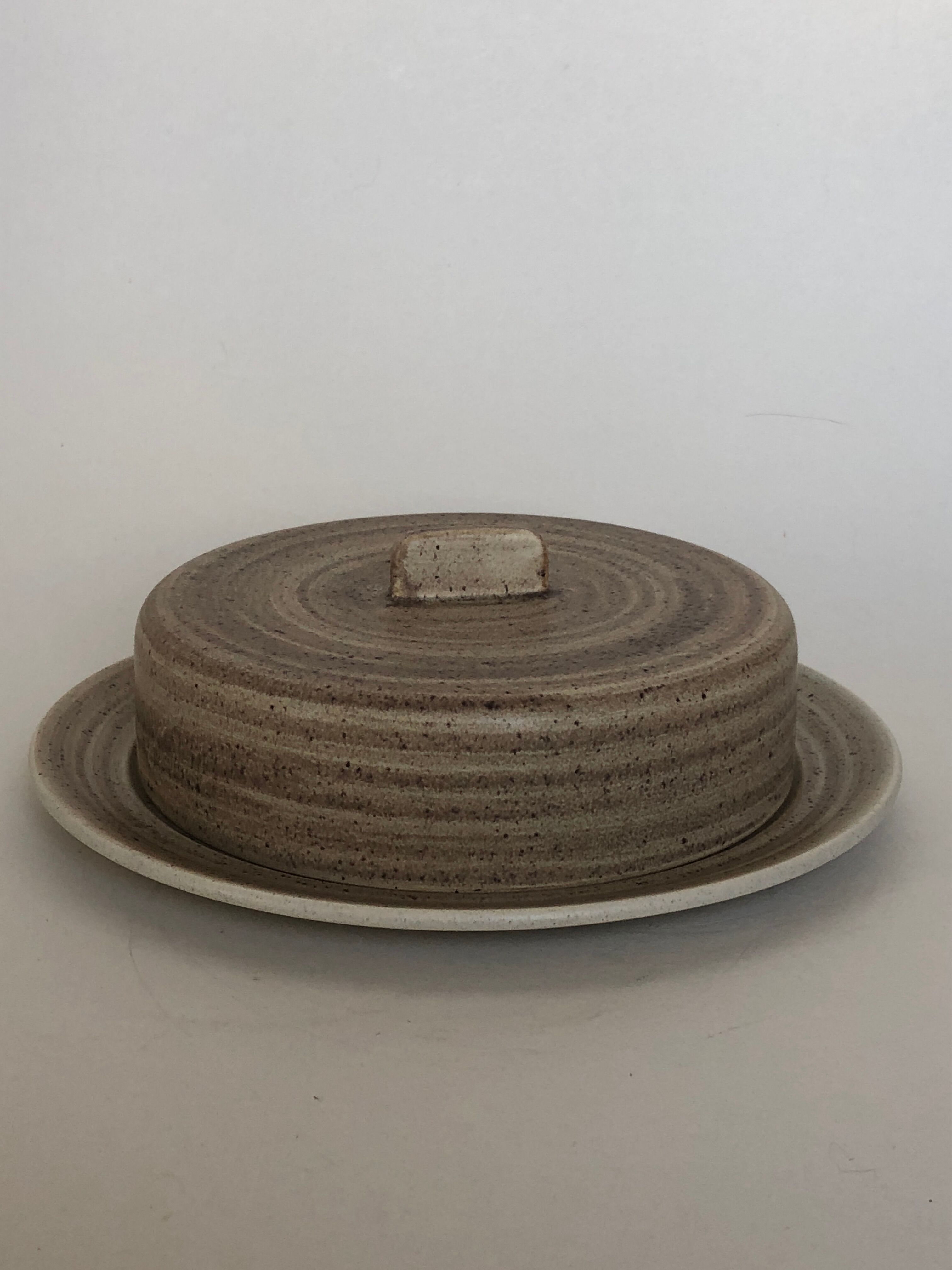 Dish with Bell in speckled sandstone