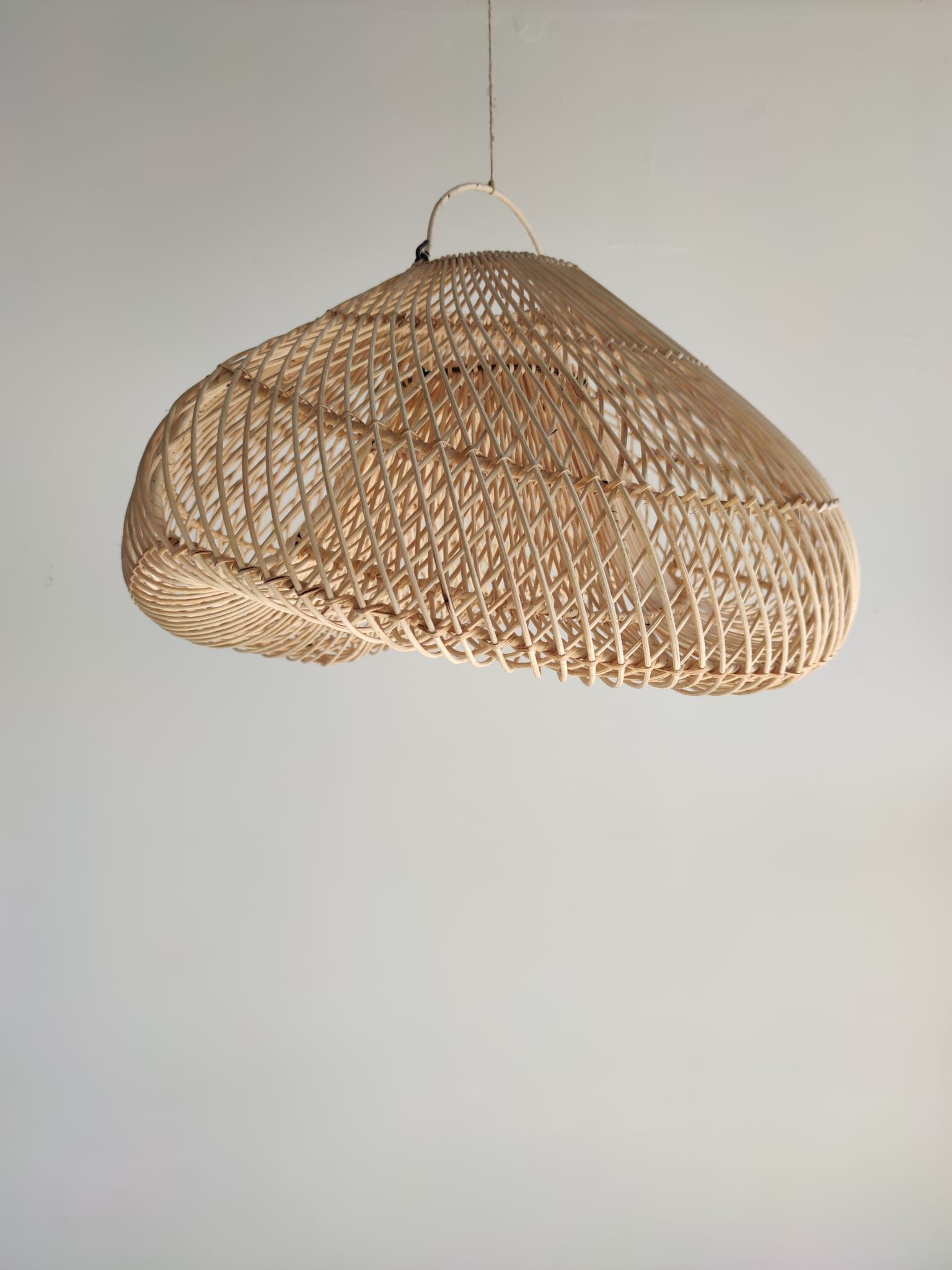 Small rattan lampshade in the shape of a braided hat