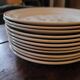 11 dinner plates decorated with stylized roses. 1950s. 11 dinner plates