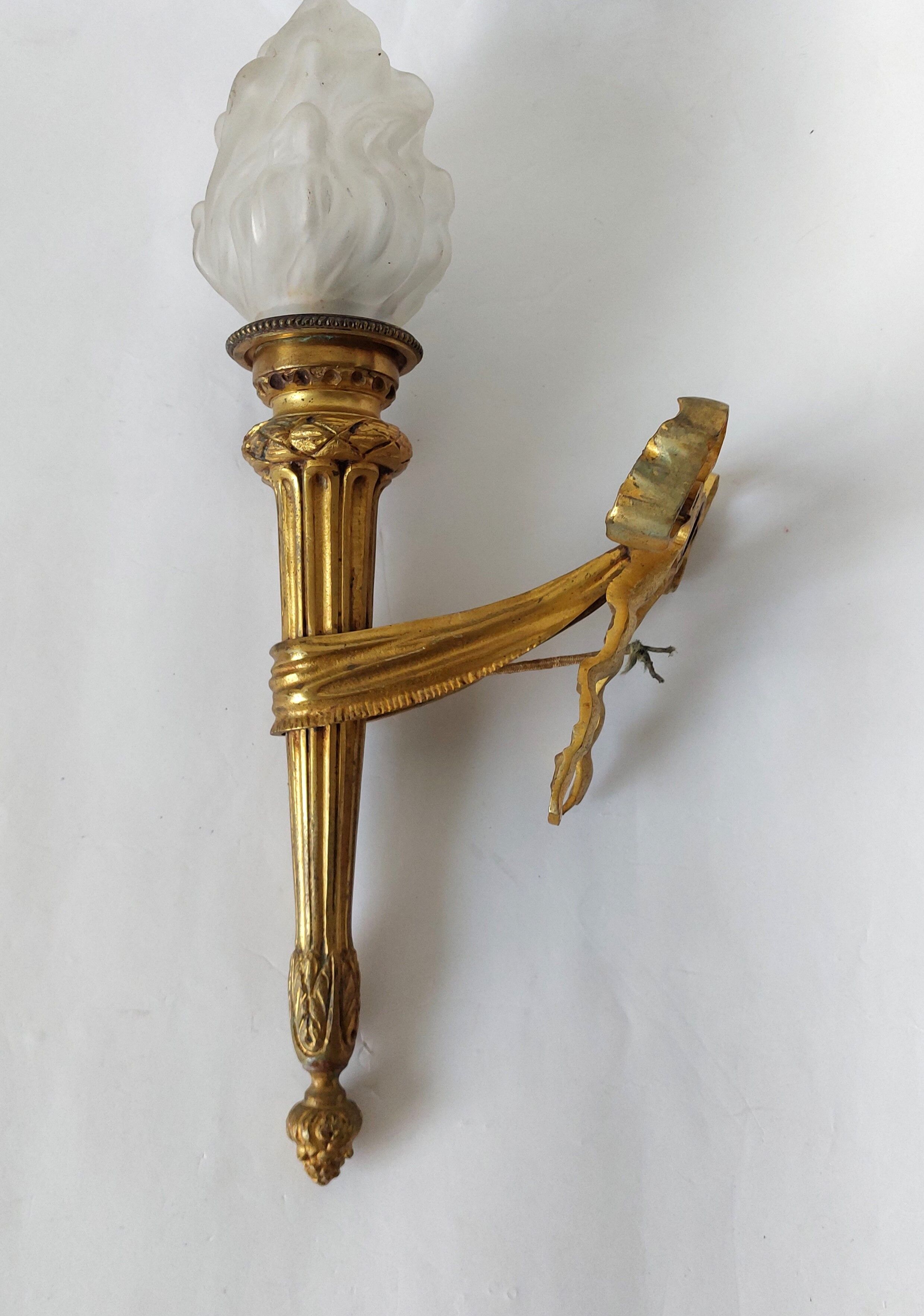 Torch wall lamp in gilded bronze Louis XVI Circa Napoleon III style.