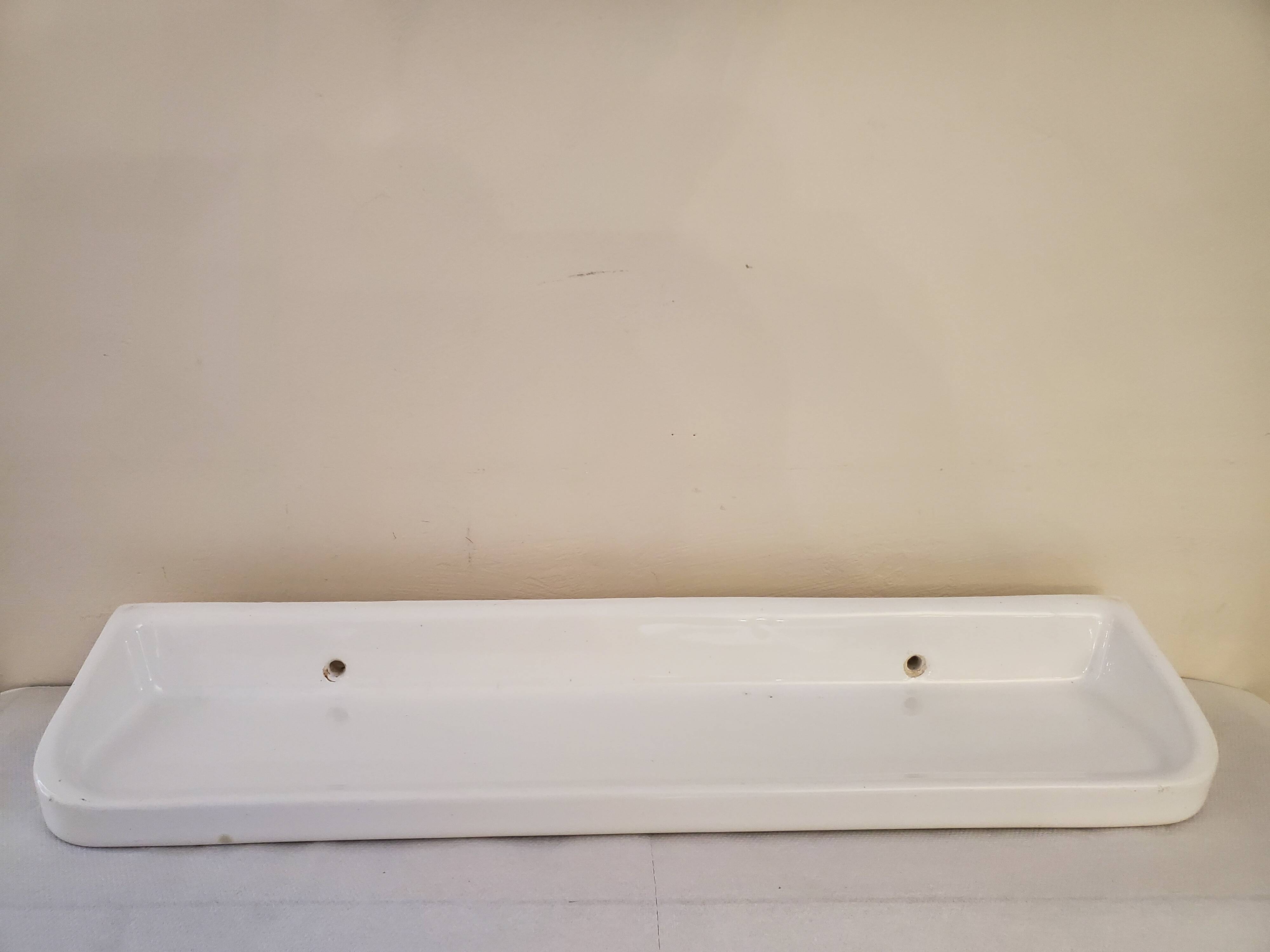 White ceramic bathroom shelf