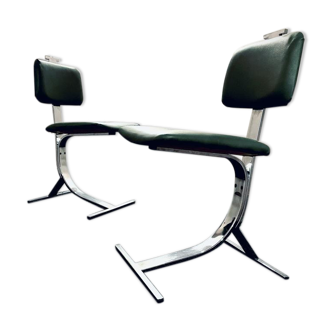 Pair of chrome-plated metal chairs