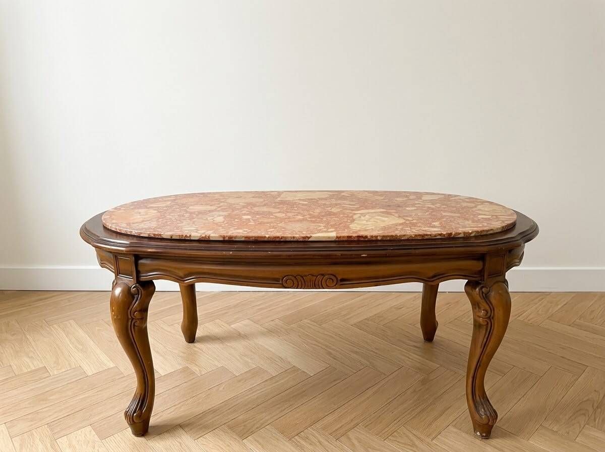 Table basse ovale en marbre et bois sculpté style baroque