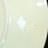 Plate in slurry with strawberry decoration and strawberry leaf