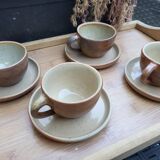 Set of 4 teacups and stoneware saucers