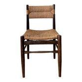 Wooden chair and brutalist straw