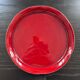 Red serrated plate