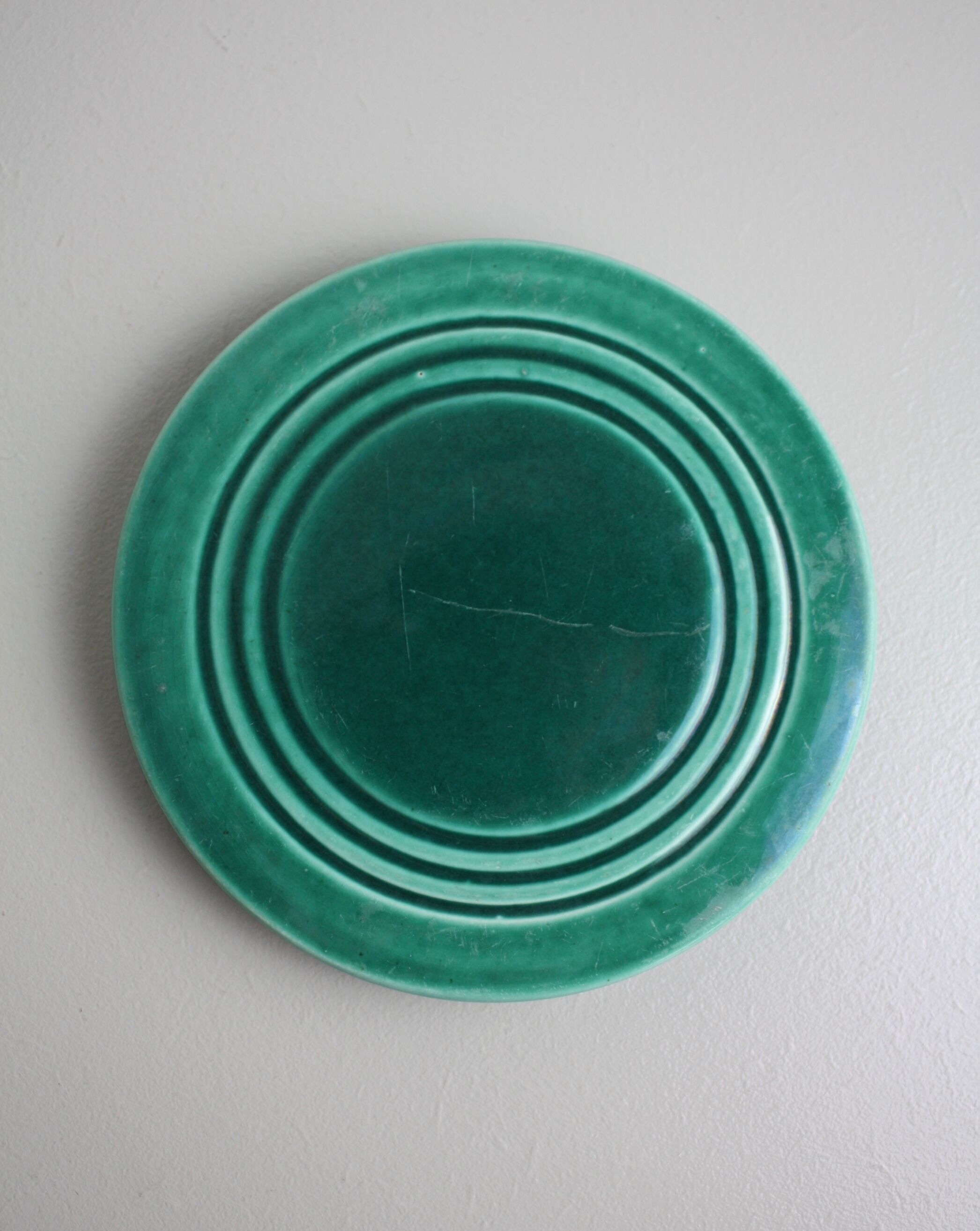 Set of 4 coasters in glass in green earthenware