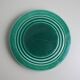 Set of 4 coasters in glass in green earthenware