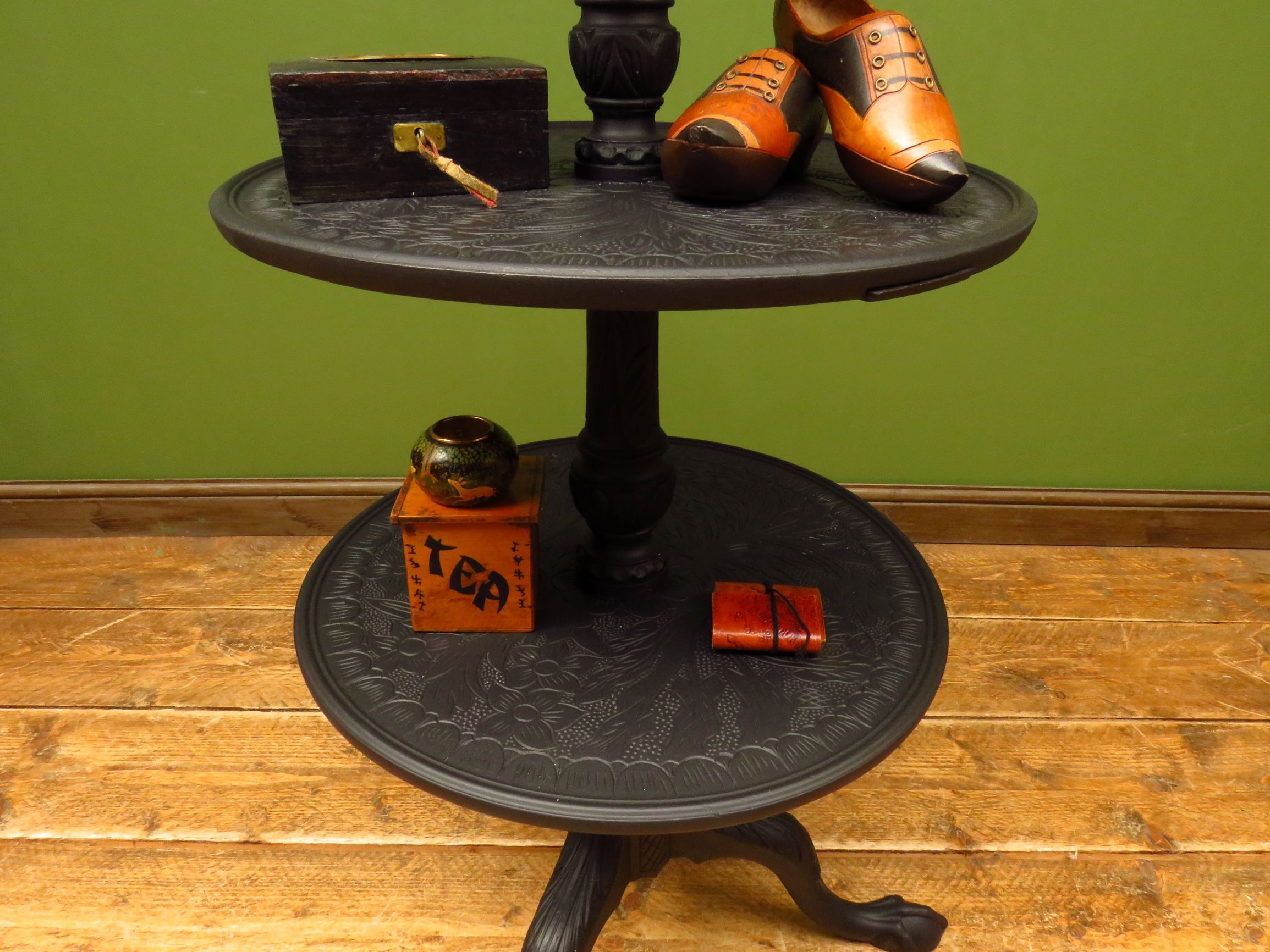 Antique black painted tiered stand