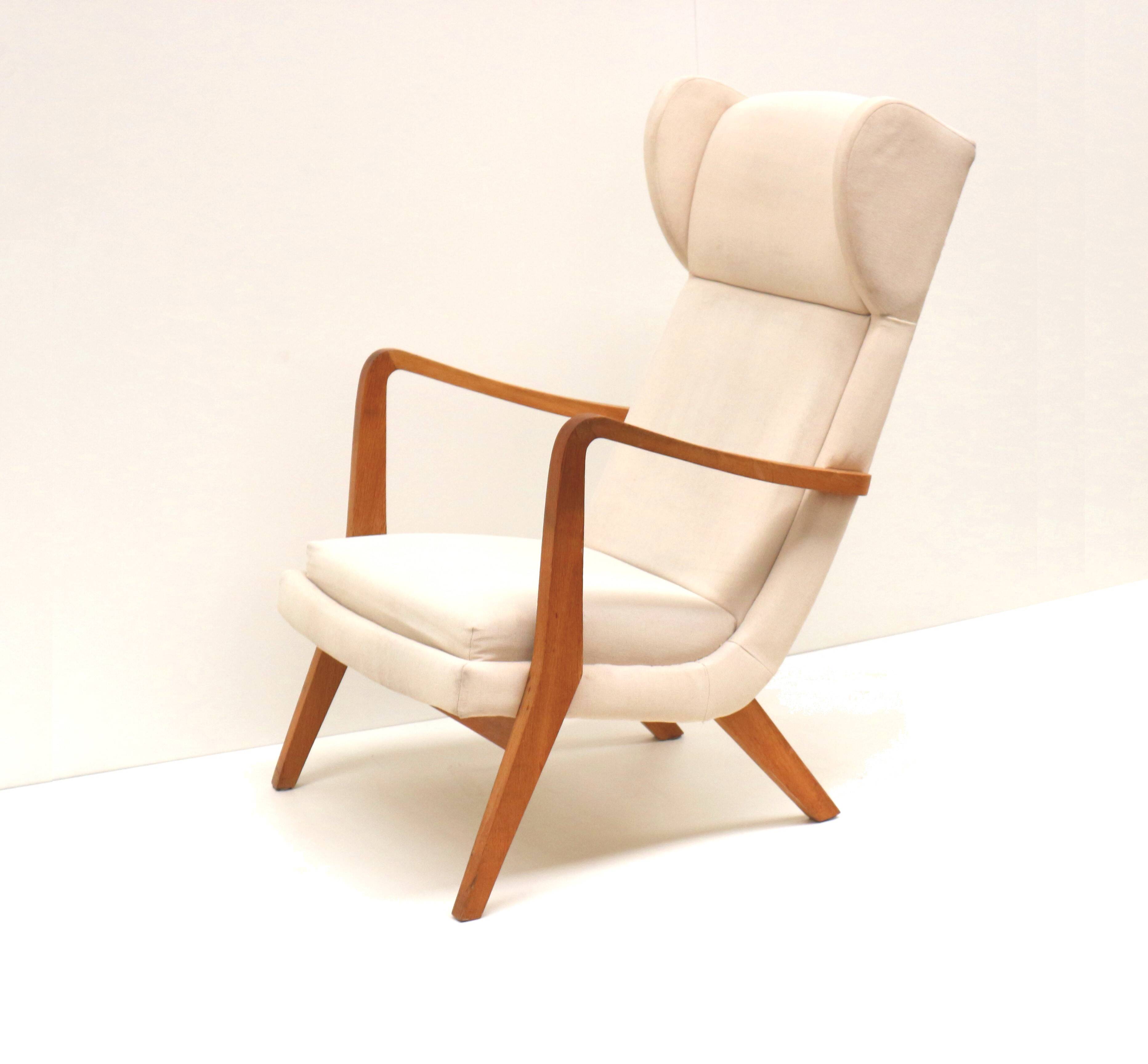 Danish design vintage armchair with cream upholstery from the 70s