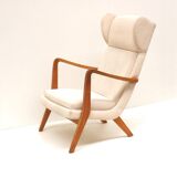 Danish design vintage armchair with cream upholstery from the 70s