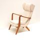 Danish design vintage armchair with cream upholstery from the 70s