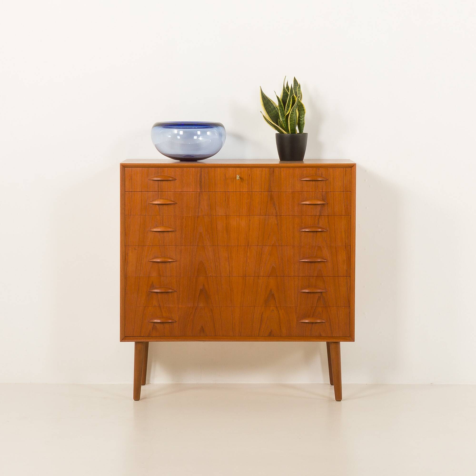 Scandinavian teak chest of drawers by Johannes Sorth for Nexo Mobelfabrik.