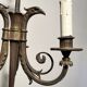 Empire-style bronze chandelier with 3 arms of light topped with eagle heads. French work. Circa 1900.