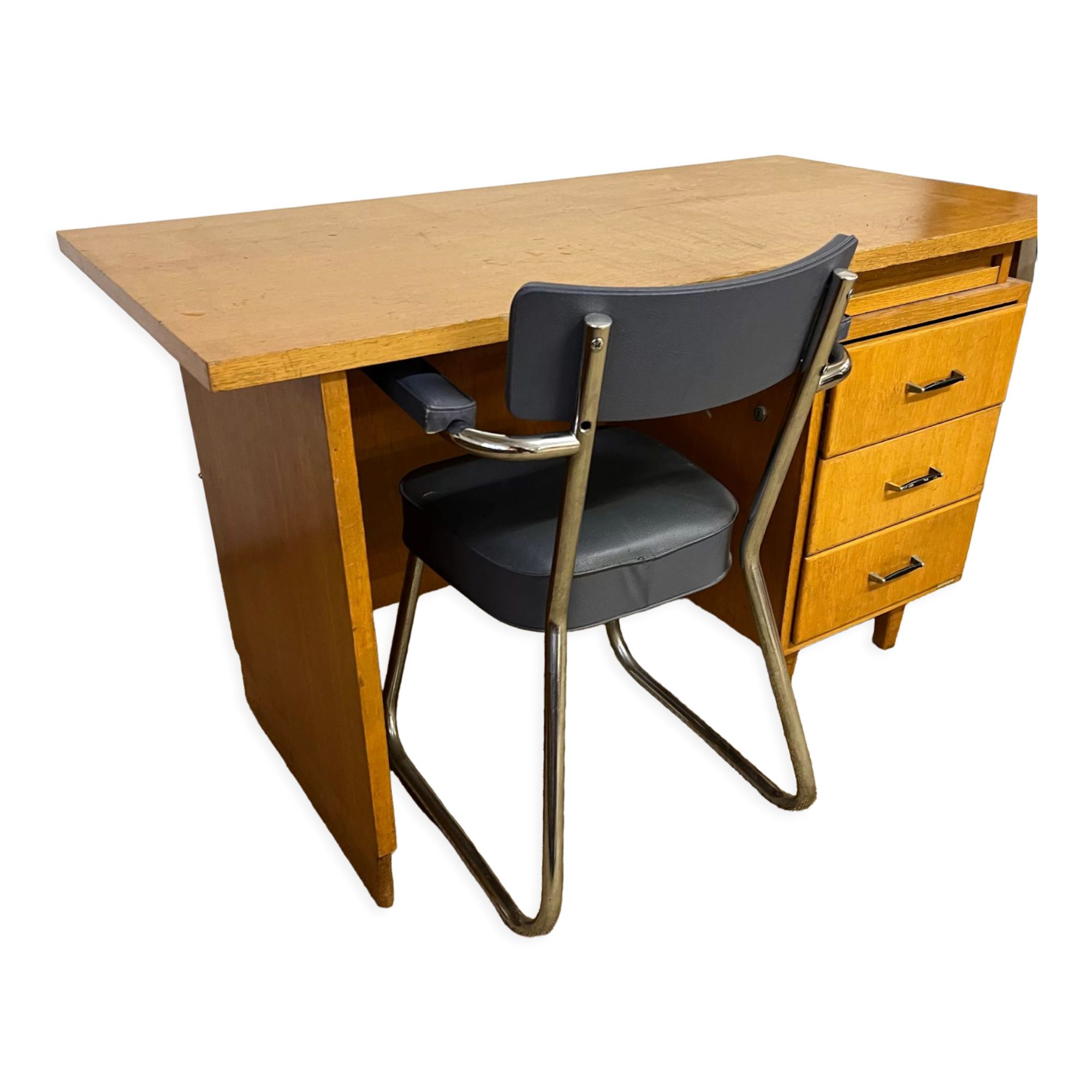 Old wooden desk and armchair