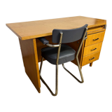 Old wooden desk and armchair