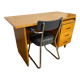 Old wooden desk and armchair