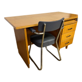 Old wooden desk and armchair