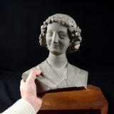 Terracotta bust of the smiling angel from Reims Cathedral with base