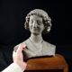 Terracotta bust of the smiling angel from Reims Cathedral with base