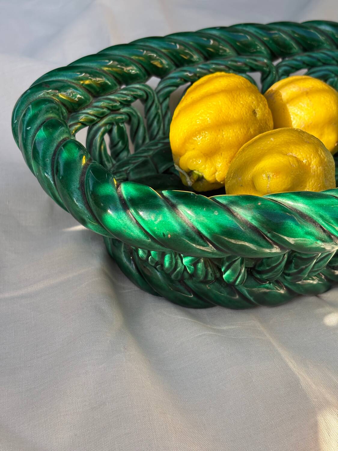 Green woven ceramic basket