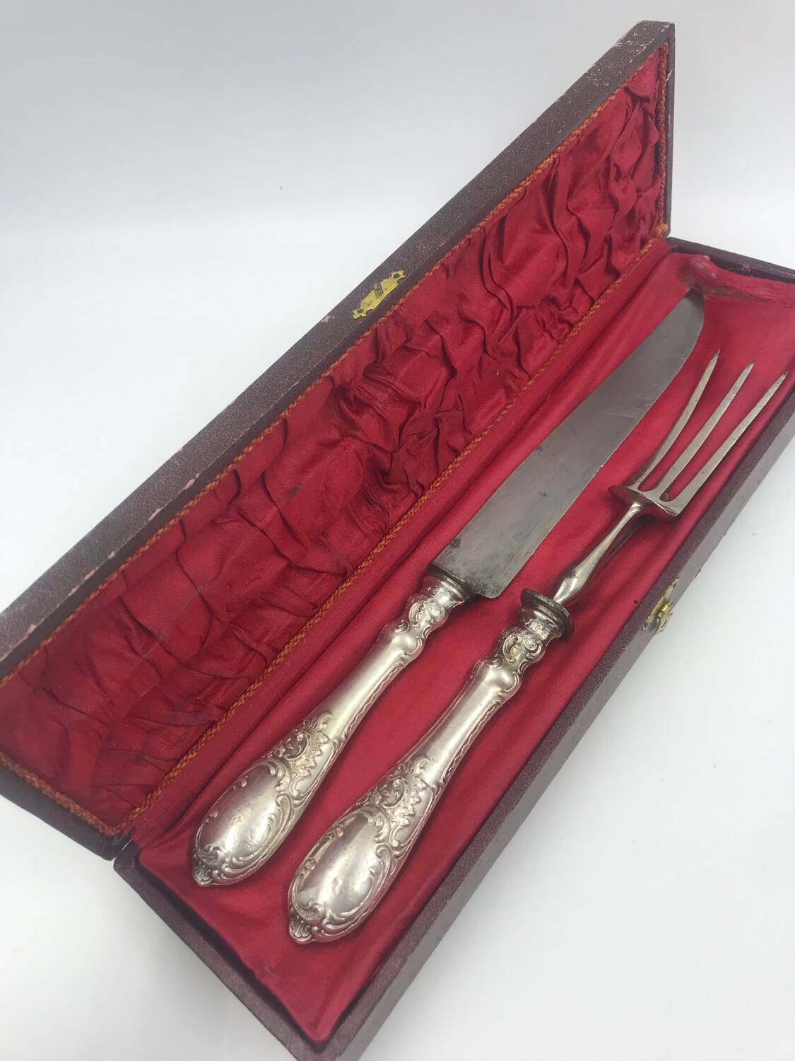 Antique silver-plated metal serving cutlery.