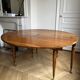 Large oval table from the early 19th century in walnut, 3.17m with extensions.