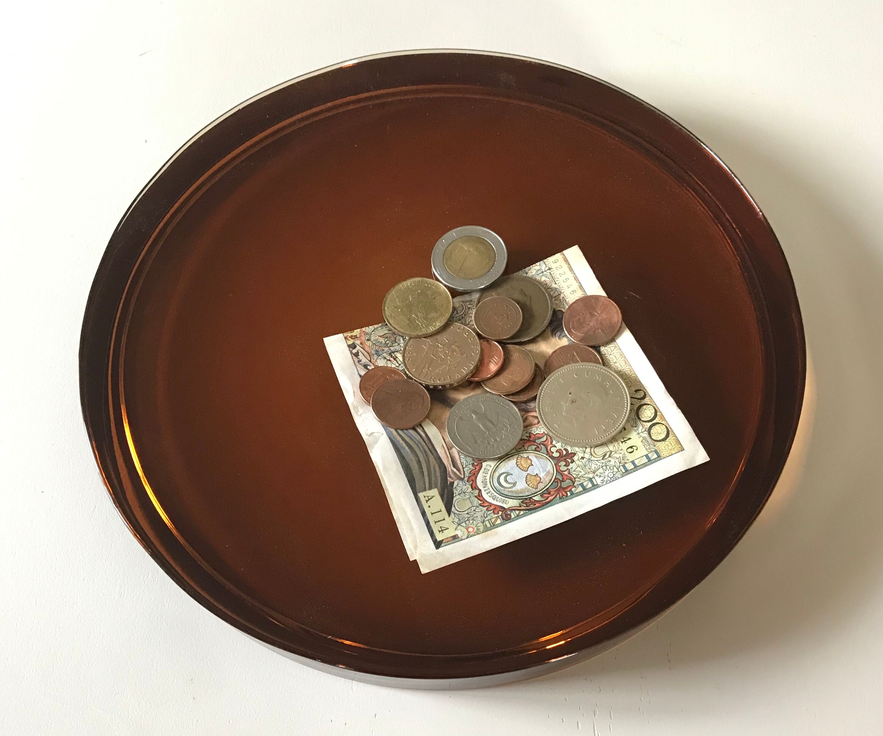 Empty vintage amber glass pocket