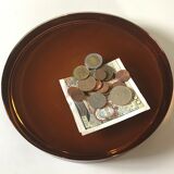 Empty vintage amber glass pocket