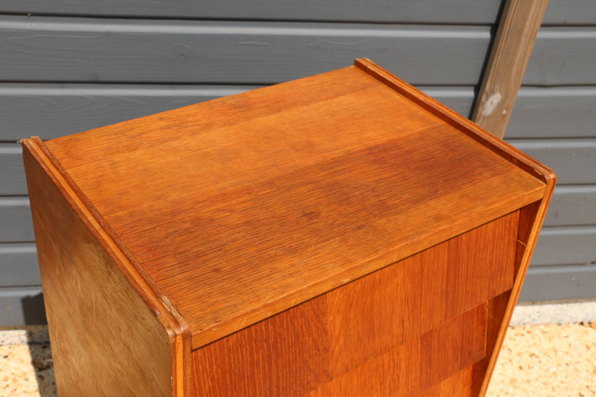 Dark chest of drawers with 5 drawers from the 1950s