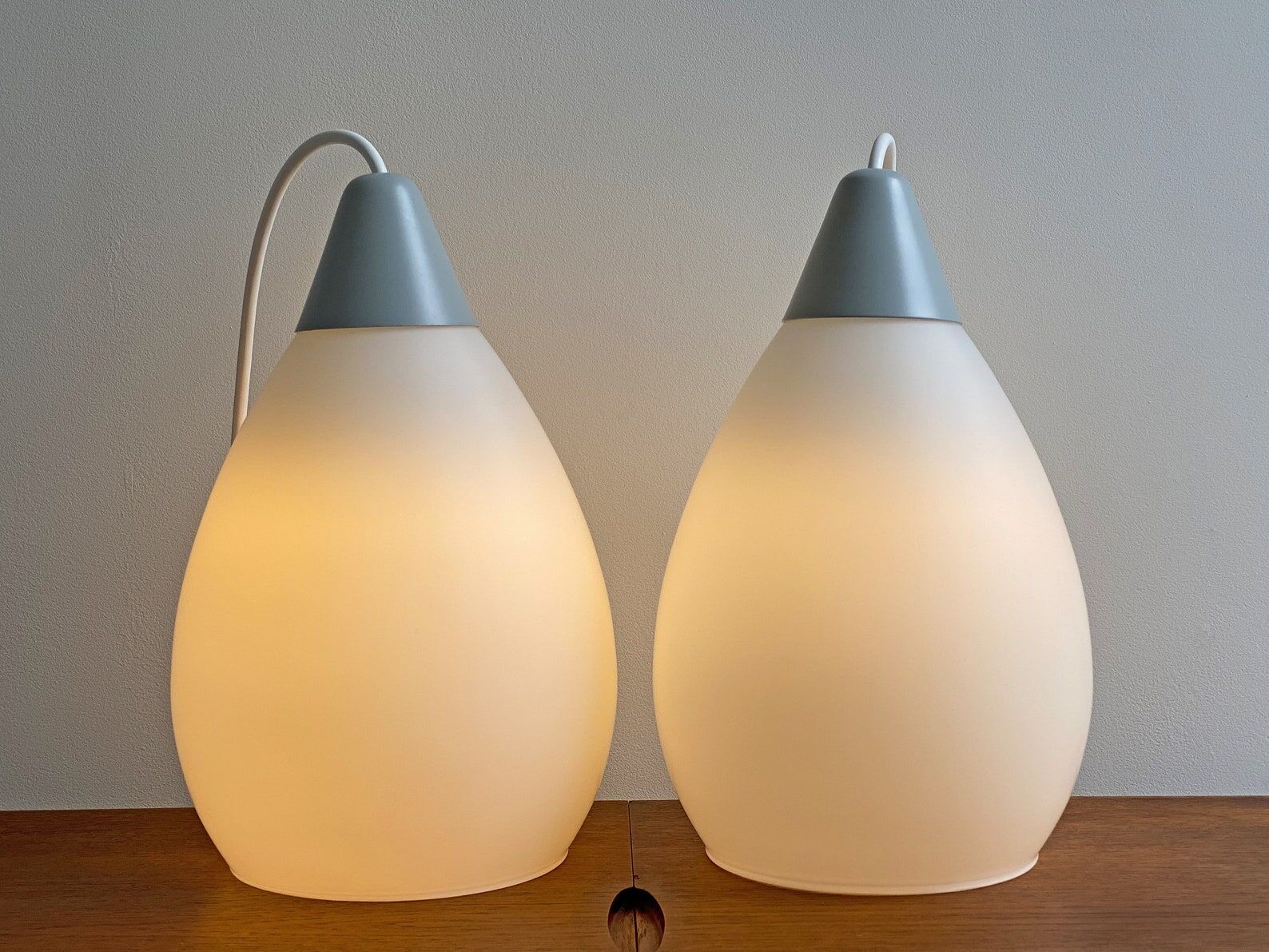 Mid century milk glass hanging lamps dutch design