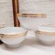 Trio de bols en porcelaine blanc et or