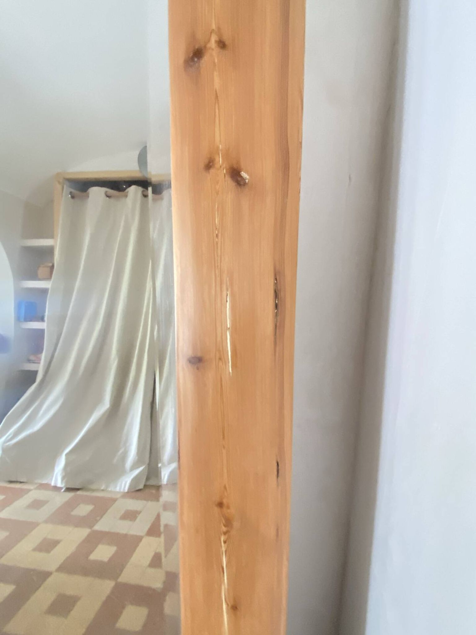 Very large mirror in antique pine.